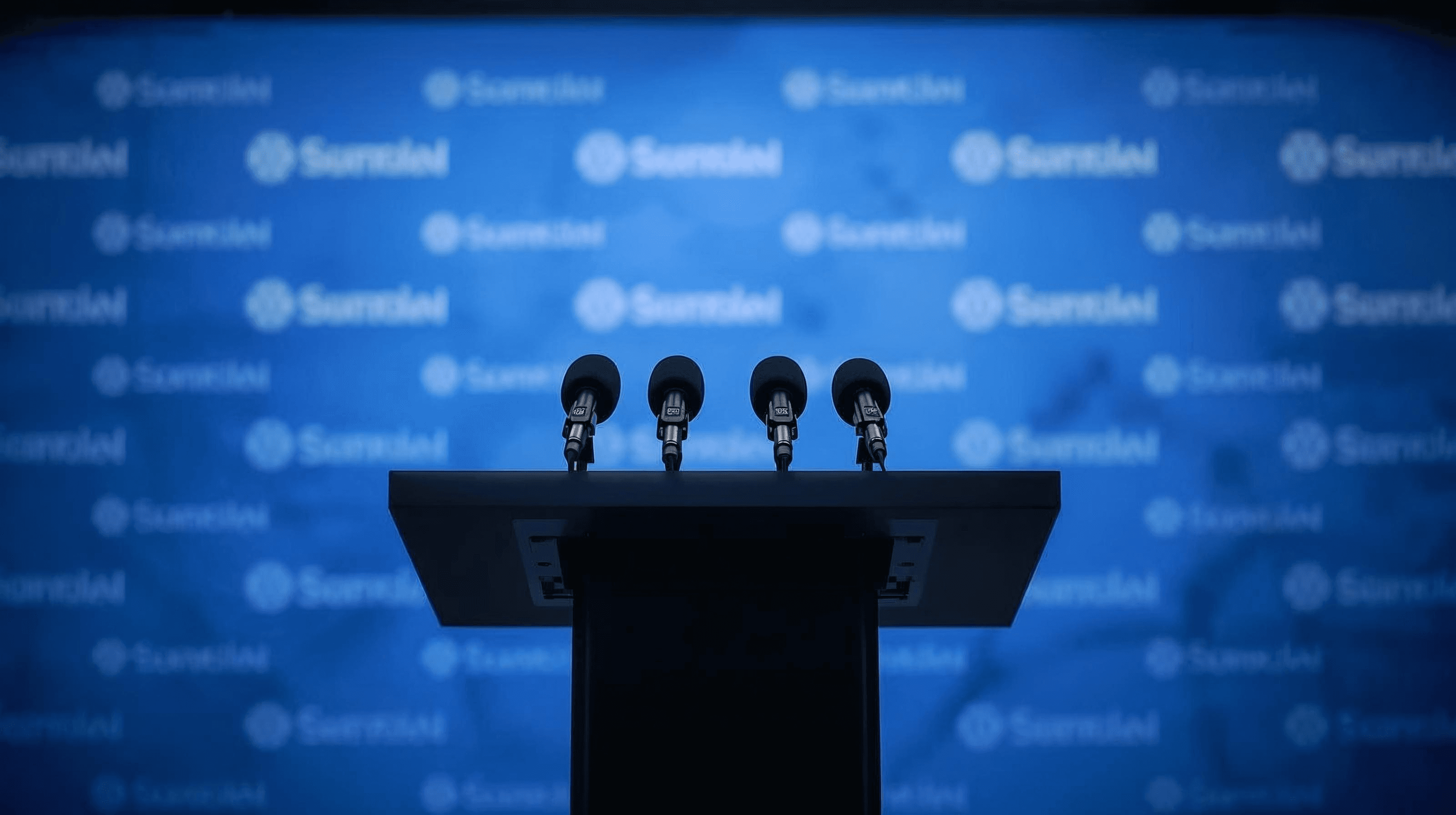 Press conference microphone with blue background
